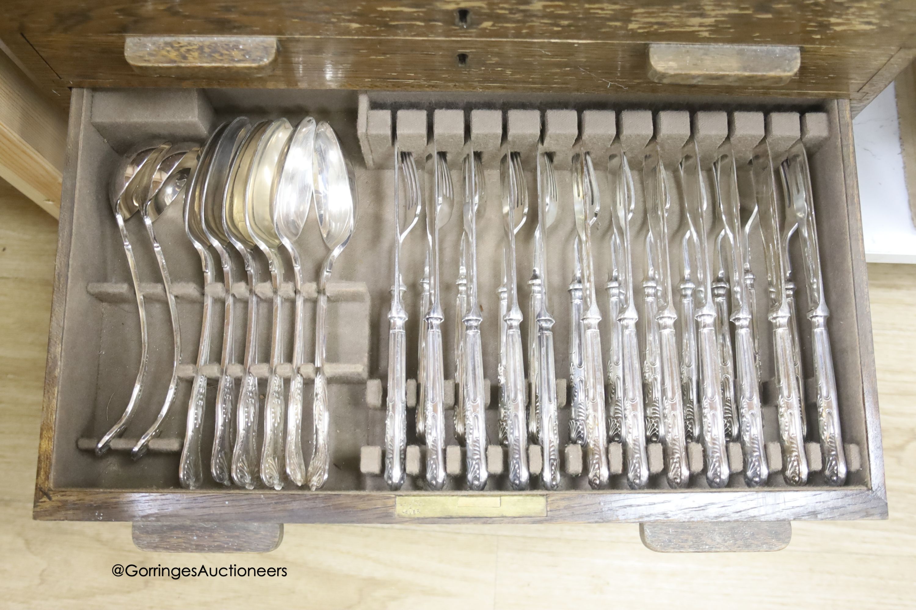 A Mappin and Webb canteen of silver plated Kings pattern cutlery, twelve place setting